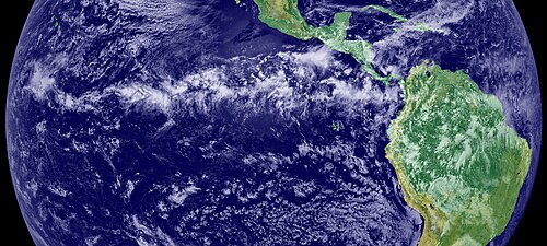The ITCZ is visible as a band of clouds encircling Earth near the Equator.