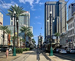 Facing riverwards (south) on Canal Street in the Central Business District. The Sheraton New Orleans, New Orleans Marriott and Four Seasons Hotel and Private Residences New Orleans are visible.