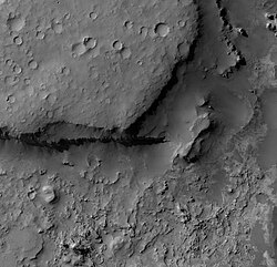Visible layers on floor of Wislicenus due to erosion (HiRISE)