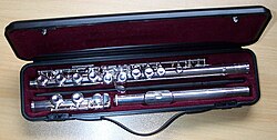 A closed hole beginner Yamaha FL211 flute in case