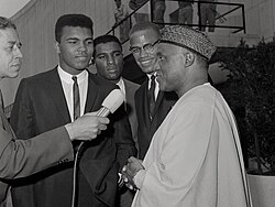 Ali with Mal Goode, Rahaman Ali, Malcolm X, and Simeon Adebo at the United Nations in New York City, 1964