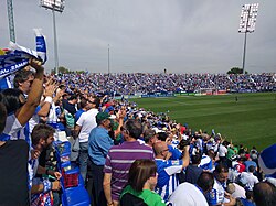 Leganés supporters celebrating their team's goal against Barcelona.