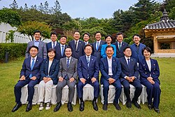 Lee poses for a group photo with members of the National Assembly from the Democratic Party at the presidential residence in Hannam-dong, Seoul, 7 June 2025.