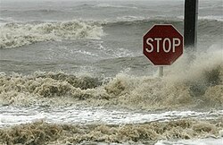 Waves crash against a stop sign in Bay St. Louis, Mississippi, as Hurricane Gustav hits the Gulf Coast