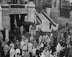 General MacArthur speaks during the ceremony restoring the Capitol to the Republic of Korea