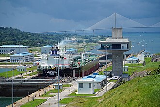 A Neopanamax ship passing through the Agua Clara locks