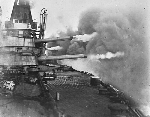 The gun trials of the Brazilian dreadnought Minas Geraes, the ship that began the dreadnought race.[A] Here, all guns capable of training to the port side were fired, forming what was at that time the heaviest broadside ever fired off a warship.