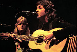 Paul McCartney and Wings performing in 1976 (Paul and Linda McCartney pictured)
