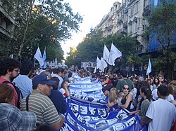 Flag with images of those who disappeared during a demonstration in Buenos Aires to commemorate the 35th anniversary of the 1976 coup in Argentina