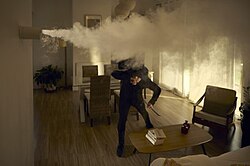 An artificial opacifying fog triggered remotely to scare off burglars.