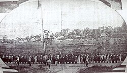 The flag of Peru flies over the port of Leticia after the takeover