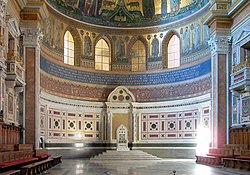 The papal throne (cathedra), in the apse of Archbasilica of Saint John Lateran, symbolises the Holy See.
