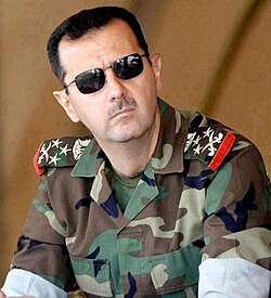 Uniformed Assad, reoccuring photo in propaganda images.