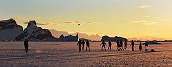 Members of the HMS Protector playing football in Antarctica (2013).