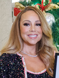 Singer and actress Mariah Carey, who was born to parents of African-American and Irish-American lineage, identifies as both Black and mixed-race.