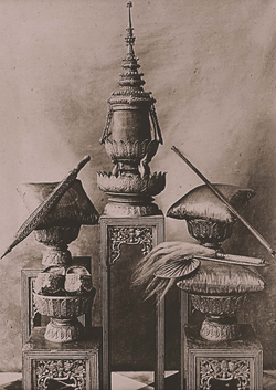 The five items of the Royal Regalia of Thailand. The Great Crown of Victory is displayed on top of this photograph.