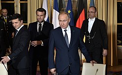 Zelenskyy, French president Emmanuel Macron and Russian president Vladimir Putin meeting in Paris on 9 December 2019 in the "Normandy Format" aimed at ending the war in Donbas.