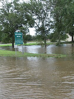 Flooding in front of a sign in New Iberia, Louisiana.