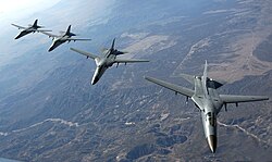 Royal Australian Air Force F-111's fly toward Nellis Air Force Base in 2006 after a refueling exercise during Red Flag training