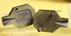 A mould for making tokens