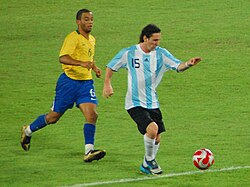 Argentina's Lionel Messi evades Marcelo in the semi-final of the 2008 Summer Olympics.