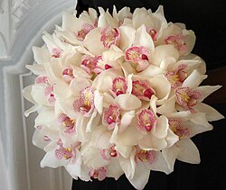 A wedding bouquet of cymbidium arranged by a florist