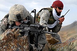 A US Army Soldier and an Afghan interpreter in Zabul, 2009
