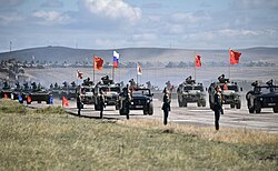 Mongolian, Chinese and Russian national flags set on armored vehicles during the large-scale military exercise Vostok 2018 in Eastern Siberia