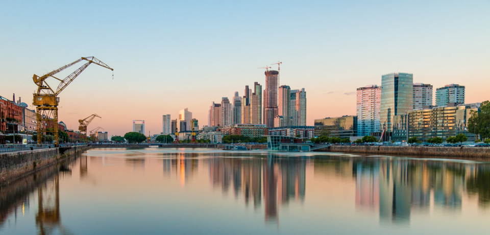 Panorama of Puerto Madero. The original warehouses can be seen at left and high-rise buildings at right.