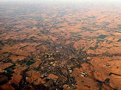 Most of north central Indiana is rolling to flat farmland dotted with small cities and towns, such as North Manchester. Much of Northern Indiana is considered part of Amish Country and holds the nation's second largest population of such people.