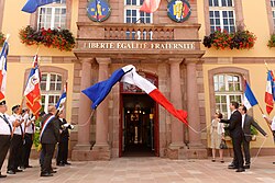 France's national motto Liberté, égalité, fraternité, seen on a public building in Belfort