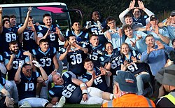 UCD players celebrating their second Shamrock Bowl victory in 2024.