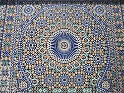 Example of a large-scale geometric rosette composition from later periods in Morocco, covering a fountain built in 1913 at Place el-Hedim in Meknes[30]