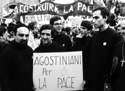 Prevost (right) at a peace rally with fellow Augustinians in Rome in 1983, protesting the installation of NATO missiles. It was organized by a coalition of pacifist groups, including organizations connected to the Italian Communist Party.[271]
