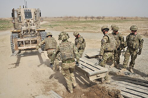 Royal Engineers preparing site for a bridge in Afghanistan.