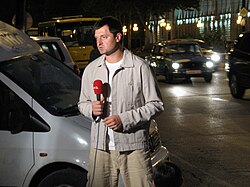 Reporter from 1+1 reporting live outside the parliament in Tbilisi during the Russian-Georgian War 2008