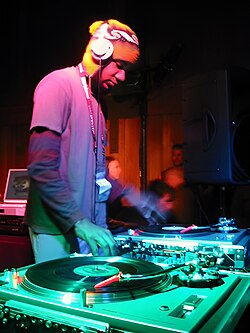 DJ Spooky at the Sundance Film Festival in 2003, using two Technics SL-1200 turntables and a DJ mixer