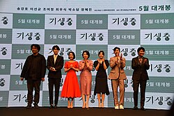 Bong and stars at a 2019 press event for Parasite.