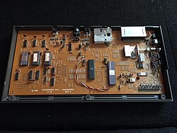 The "heart" of Commodore's philosophy: Early Commodore 16 main PCB (prototype), not used in the regular series model. According to Commodore computer engineer Bil Herd, this single-sided PCB was an extraordinary attempt of cost saving by Commodore, which probably failed due to technical problems.[29]