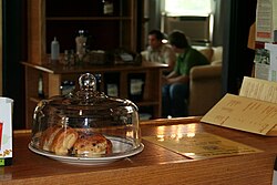Coffeehouses often sell pastries or other food items.