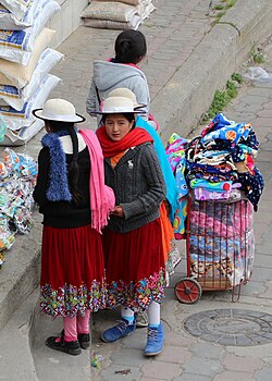 Young women wearing the typical hat