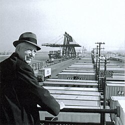 Malcom McLean at railing, Port Newark, 1957