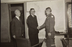 Syngman Rhee and Kim Ku, leaders of the anti-trusteeship movement, meet with General Hodge to discuss the trusteeship.