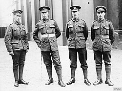 Group portrait of VC winners. Left to right: Edward Cooper (left), awarded the VC: Belgium, 16 August 1917; Robert Bye, awarded the VC, Belgium, 31 July 1917; William Ratcliffe, awarded the VC, Belgium, 14 June 1917; Wilfred Edwards, awarded the VC, Belgium, 16 August 1917.