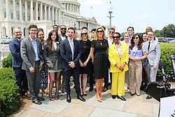 Clarke with various content creators and Representative Beth Van Duyne at the launch of the Creator Economy Caucus in June 2025.