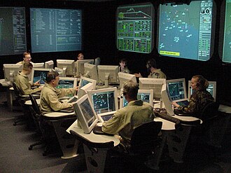 NSWC Dahlgren, Va. – Naval reservists, scientists and engineers work in the Integrated Command Environment (ICE) Human Performance laboratory located at NSWC Dahlgren, Va. The ICE lab focuses on the Navy's evolving human performance and human systems integration (HSI) testing