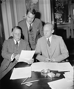 Governor Winship (left) meeting with Virgin Islands governor Lawrence W. Cramer (standing) and Senator Millard Tydings, before the Senate's Territories and Insular Affairs Committee met to consider legislation for U.S. Territories in April, 1938