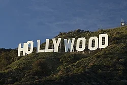 The Hollywood Sign, large white block letters on a hillside