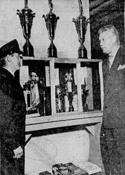 Pete King (right) speaking to Capt. Eugene C. Harman at the Van Nuys Air National Guard Headquarters in December 1951.