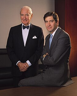 Ralph J. Roberts, founder of Comcast, with his son Brian L. Roberts, at their Philadelphia headquarters in 1999
